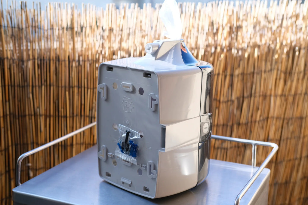 Back view of plastic wall wipe dispenser for gyms