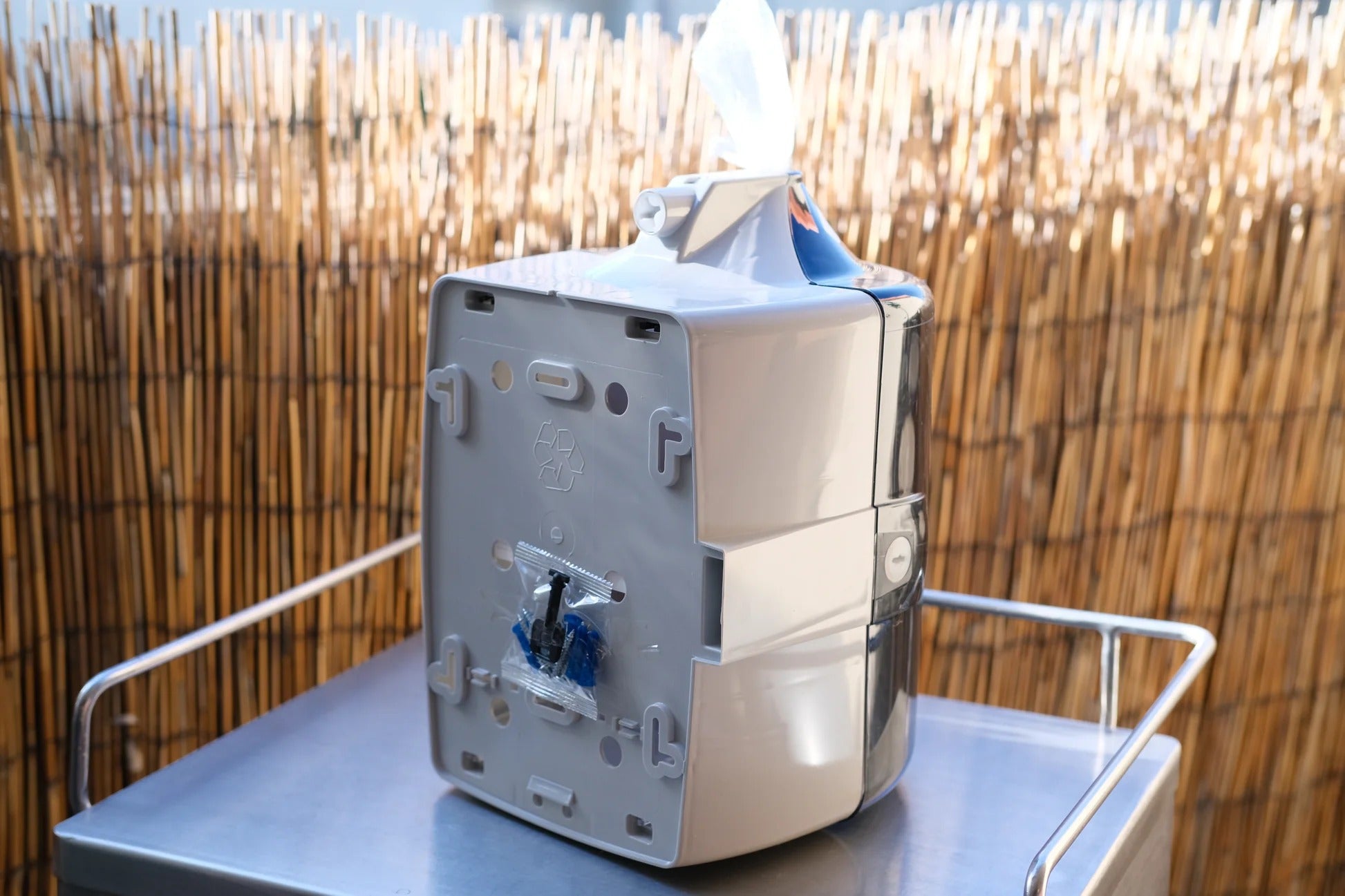 Back view of plastic wall wipe dispenser for gyms