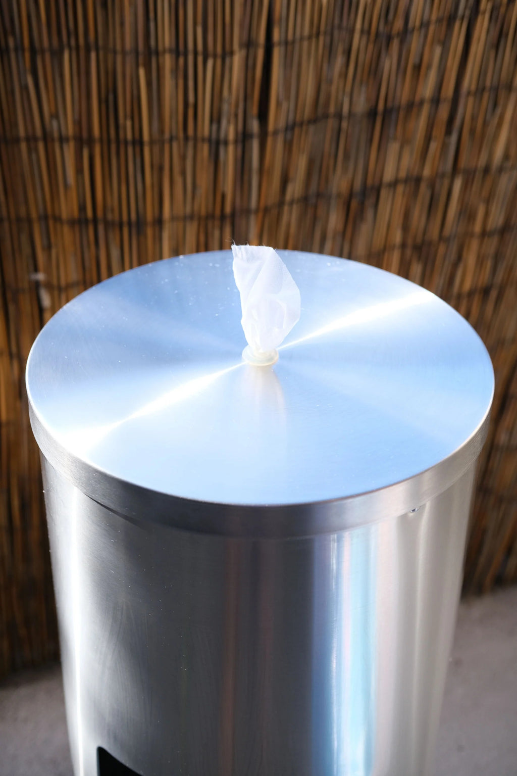 Stainless Steel Dispenser with tissue top view